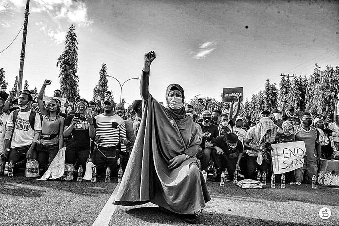 Aisha Yesufu raising her fist during EndSARS protest in Abuja