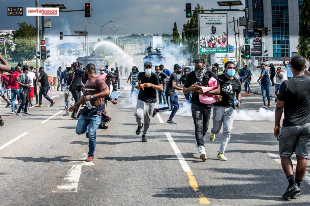 Abuja peaceful protesters running 