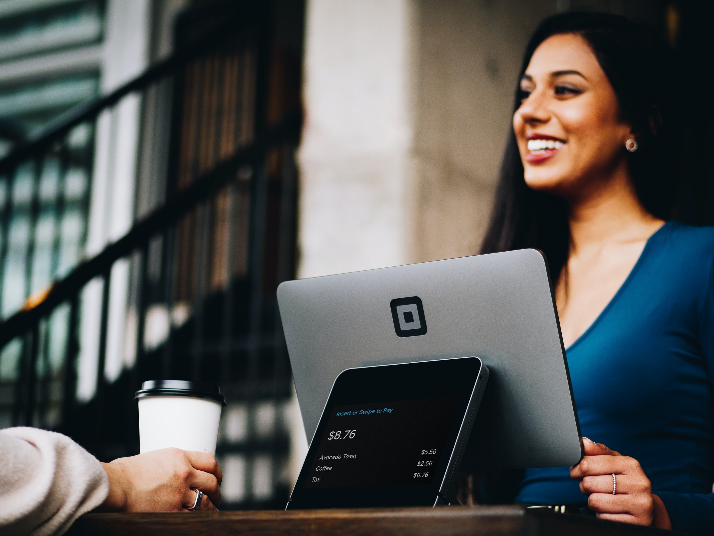 woman smiling with customer