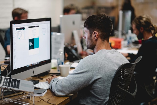 Man using desktop computer at the office